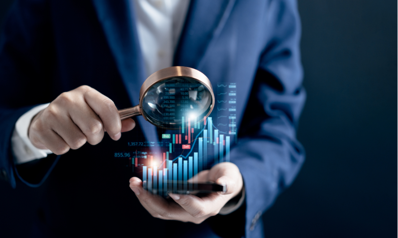 man holding magnify glass